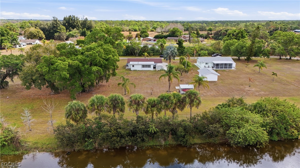 2180 Cook Lane Alva, FL 33920 - Photo 42 of 46 a view of a city with a lake