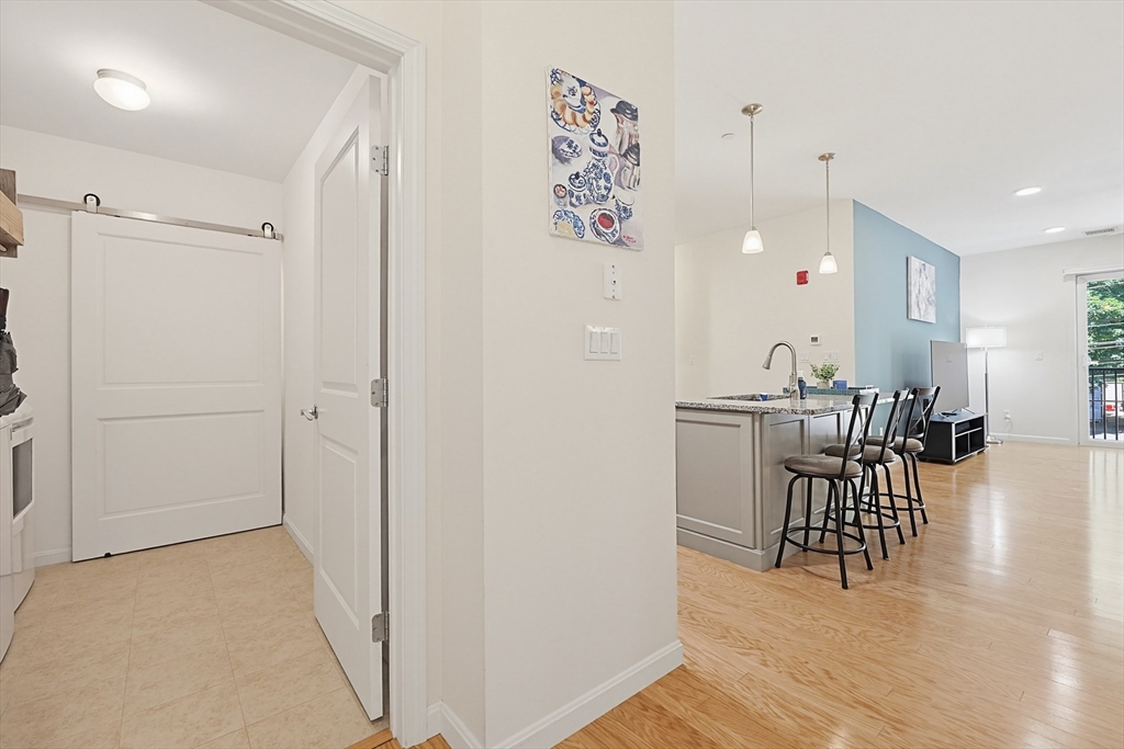 200 Revere Street, Unit 4209 Canton, MA 02021 - Photo 6 of 35 a view of a kitchen and dining room