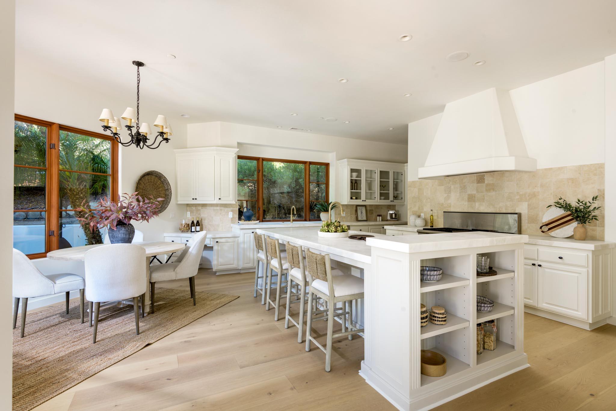 2030 Creekside Road Santa Barbara, CA 93108 - Photo 11 of 41 a very nice looking dining room with a large window and a chandelier