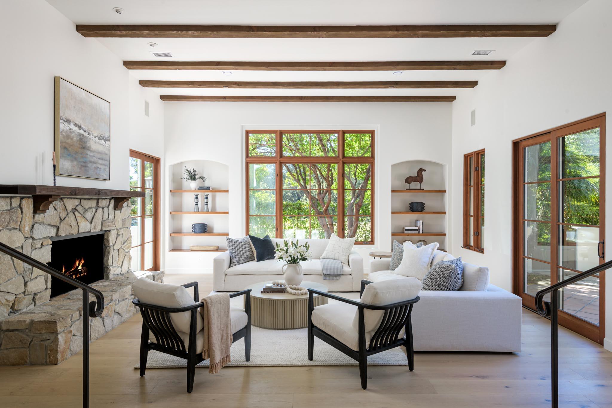 2030 Creekside Road Santa Barbara, CA 93108 - Photo 12 of 41 a living room with furniture and a fireplace