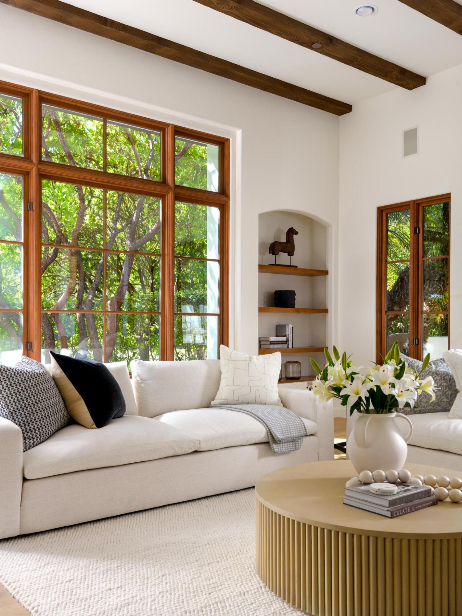 2030 Creekside Road Santa Barbara, CA 93108 - Photo 13 of 41 a living room with furniture and a large window