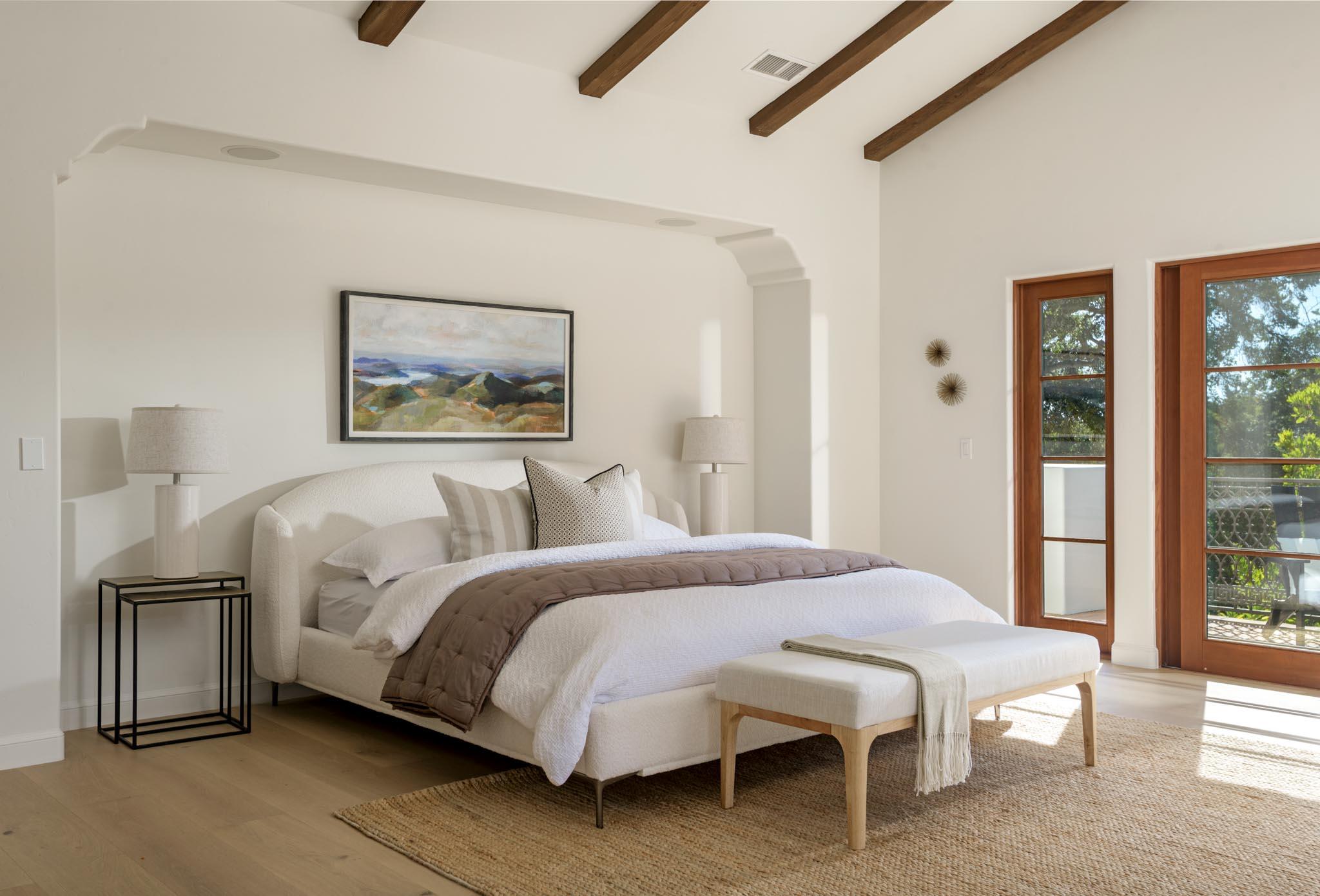 2030 Creekside Road Santa Barbara, CA 93108 - Photo 20 of 41 a bedroom with a bed and a painting on the wall