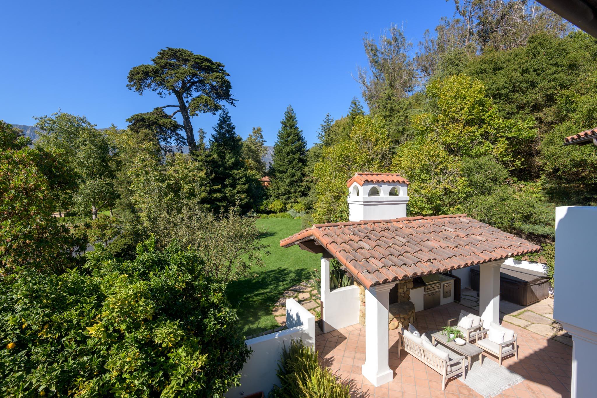 2030 Creekside Road Santa Barbara, CA 93108 - Photo 28 of 41 a terrace with a table and chairs