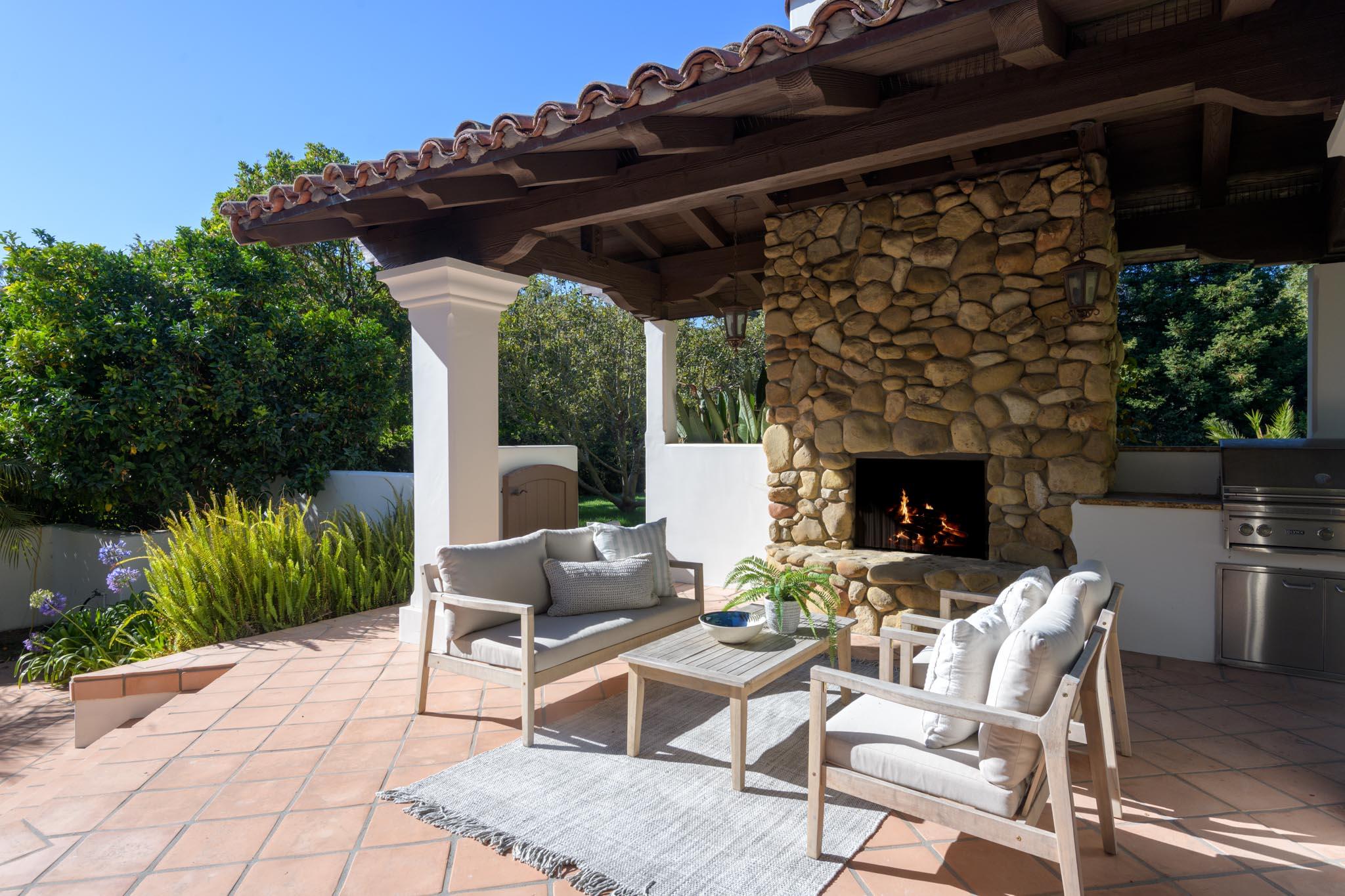 2030 Creekside Road Santa Barbara, CA 93108 - Photo 30 of 41 a patio with table and chairs and potted plants