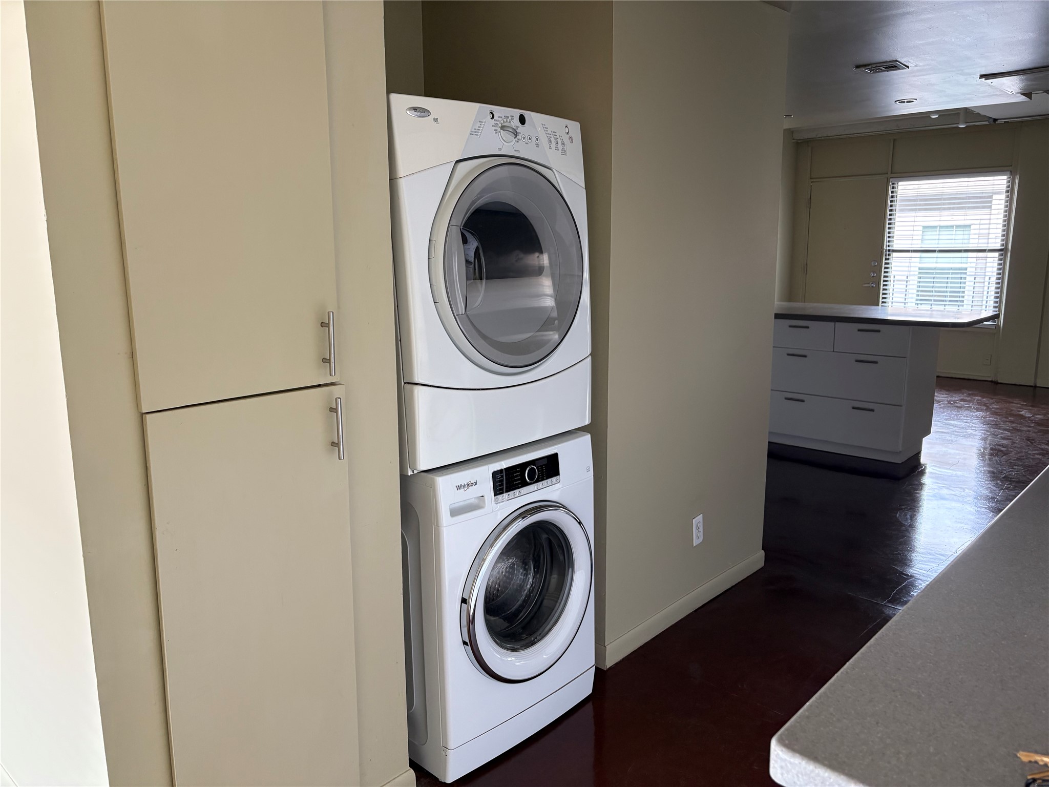 2408 Leon Street, Unit 115 Austin, TX 78705 - Photo 8 of 9 a utility room with dryer and washer