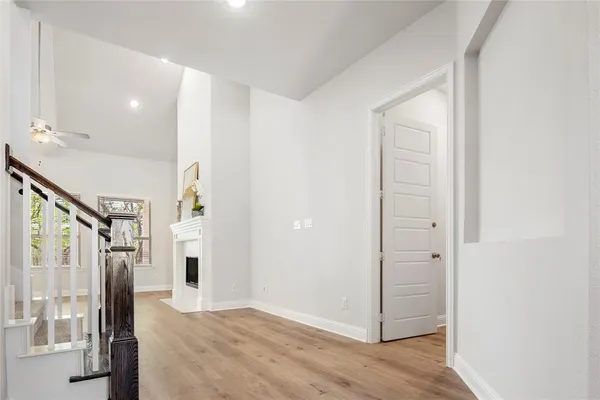 a view of entryway with wooden floor