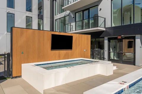 a view of swimming pool from a balcony