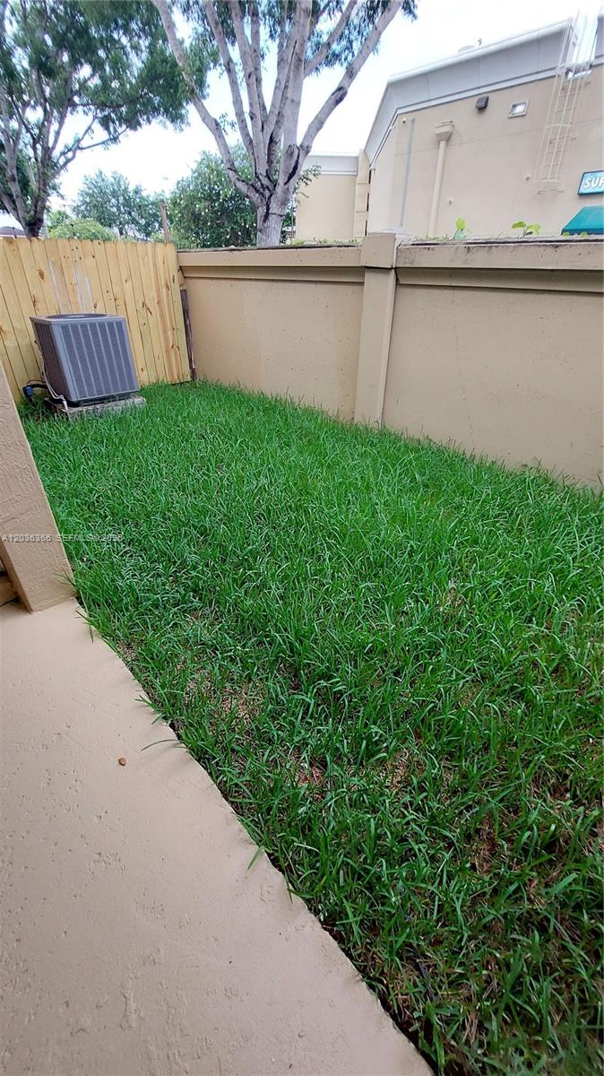 7083 Southwest 158th Court Miami, FL 33193 - Photo 12 of 22 a view of a backyard