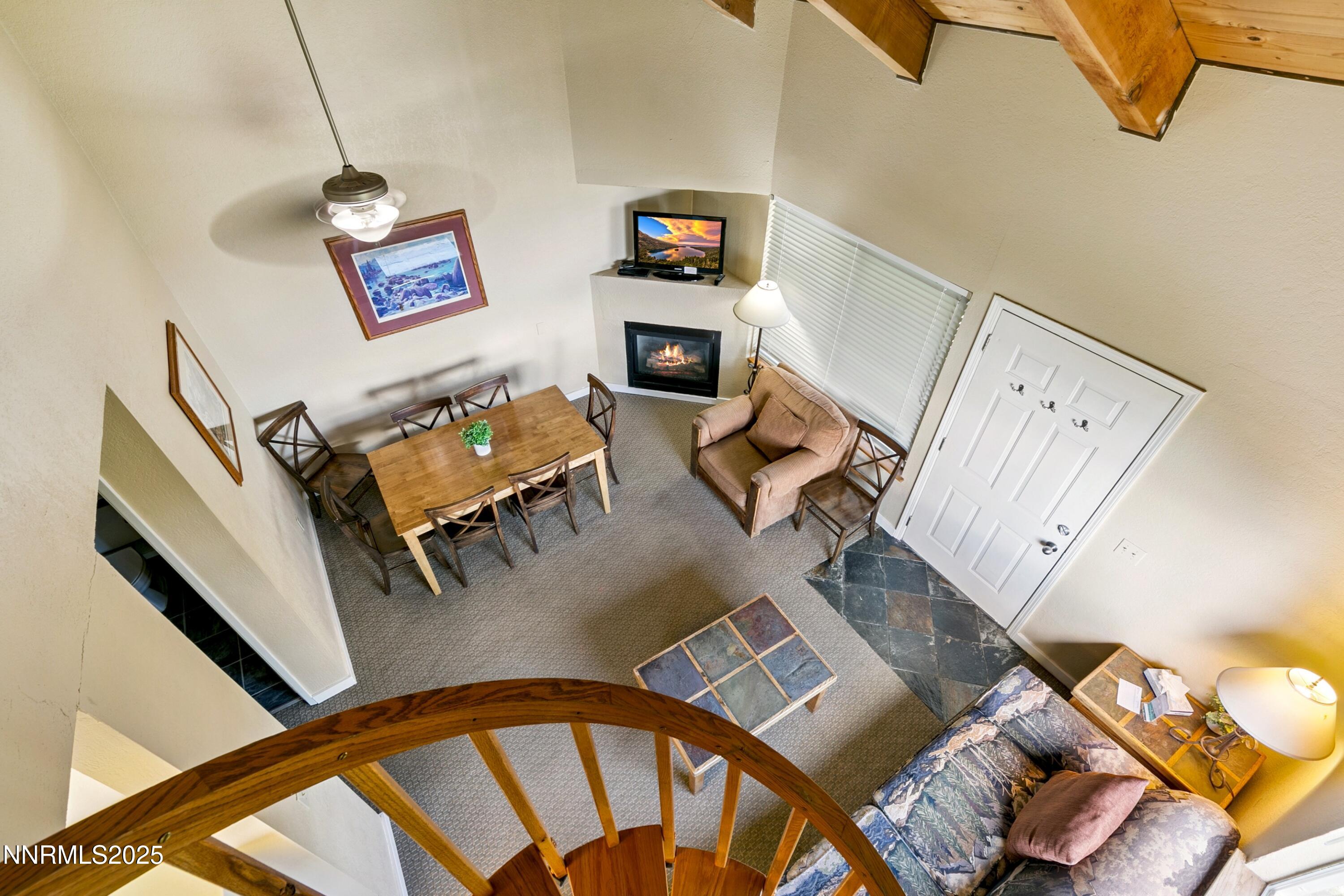 305 Galaxy Lane, Unit 8 Stateline, NV 89449 - Photo 18 of 56 a living room with furniture and a wooden floor
