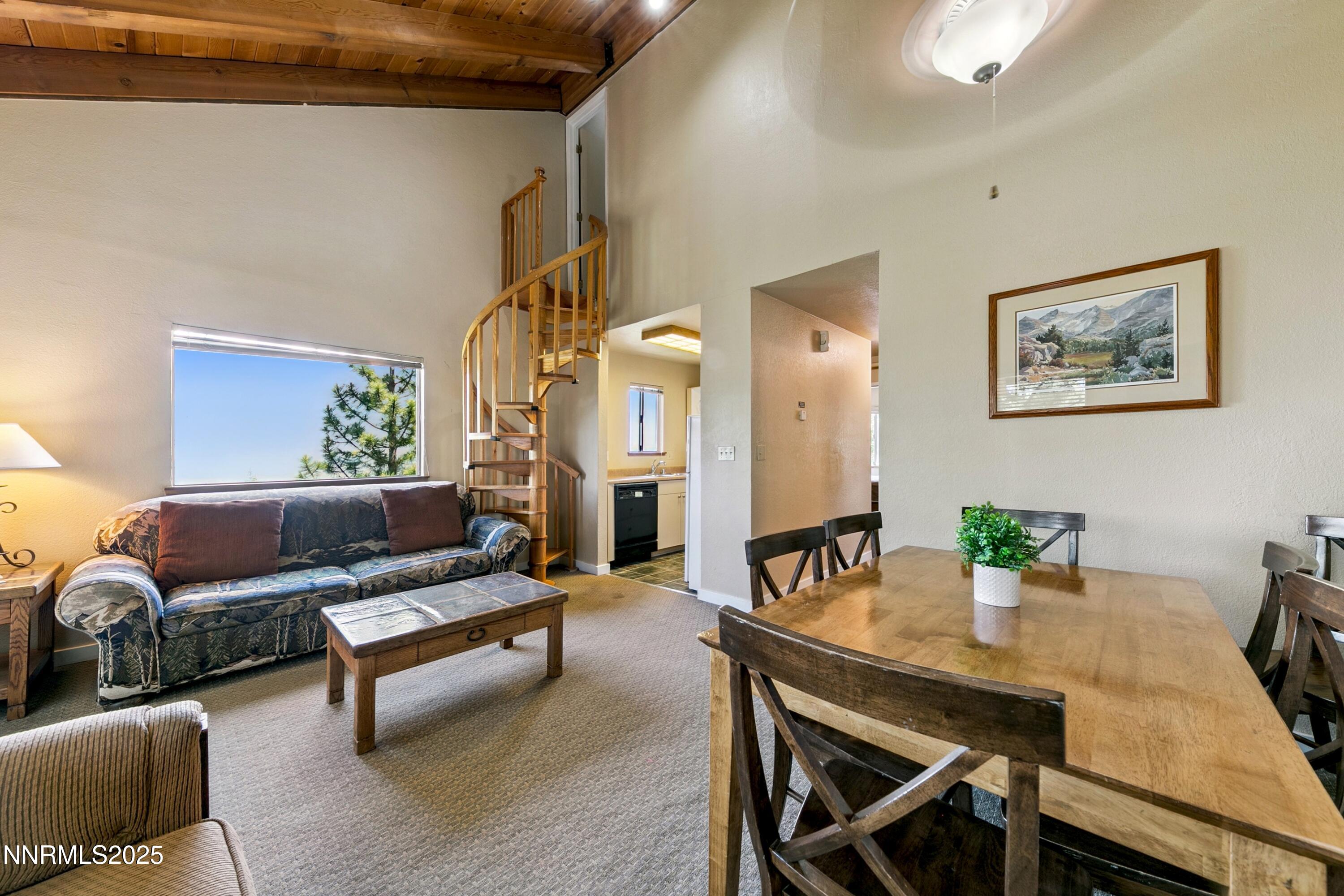 305 Galaxy Lane, Unit 8 Stateline, NV 89449 - Photo 3 of 56 a living room with furniture and wooden floor