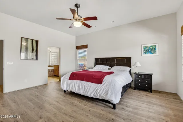 a view of a livingroom with furniture and windows