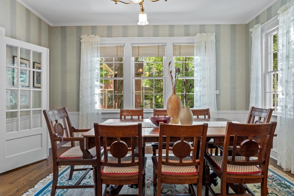 32W131 Army Trail Road Wayne, IL 60184 - Photo 4 of 30 a view of a dining room with furniture and windows