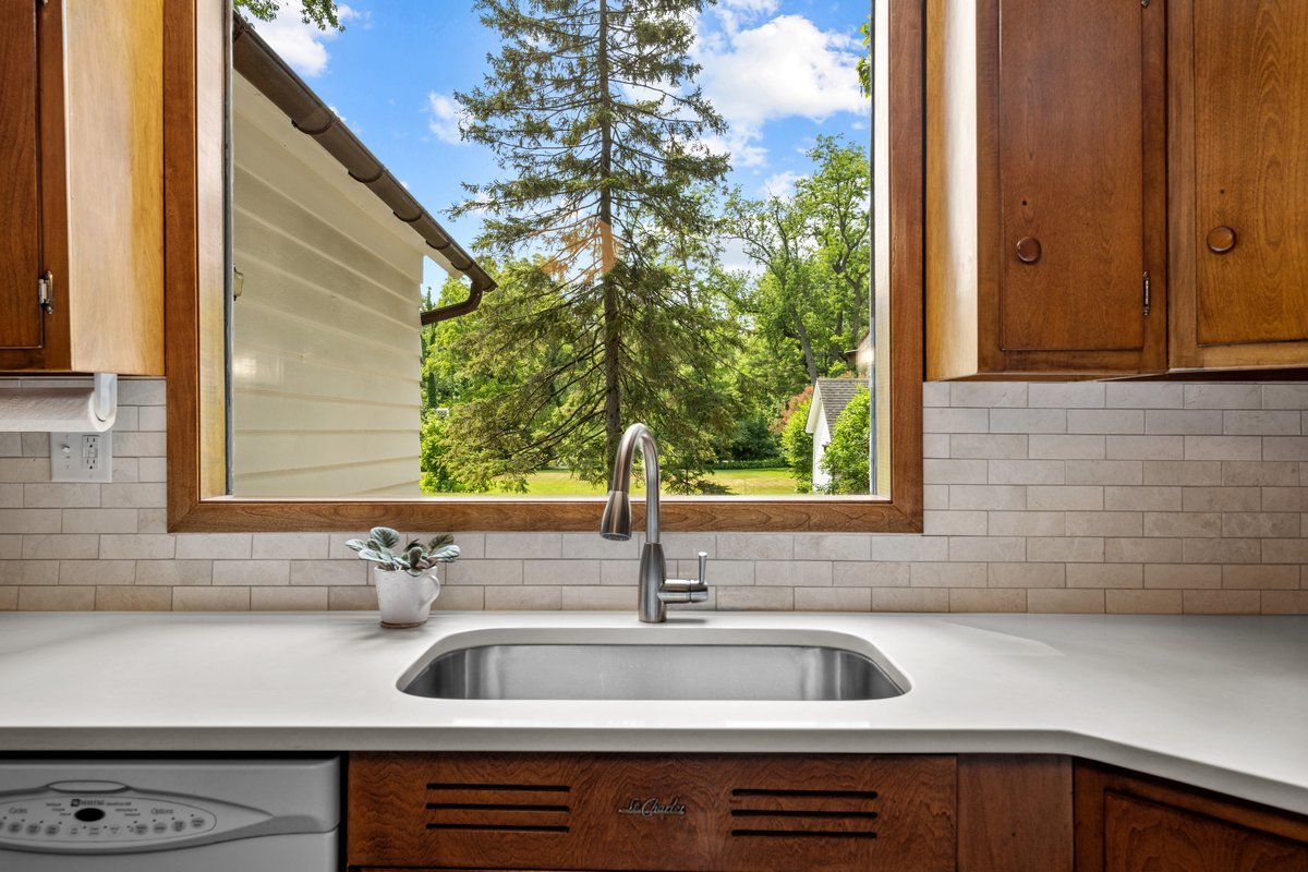 32W131 Army Trail Road Wayne, IL 60184 - Photo 9 of 30 a kitchen sink with a sink
