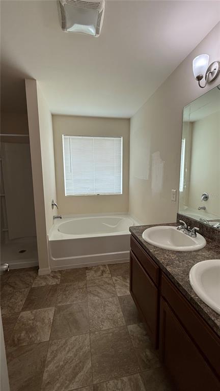 3616 Marshall Road North Port, FL 34288 - Photo 14 of 15 a bathroom with a granite countertop sink and a mirror
