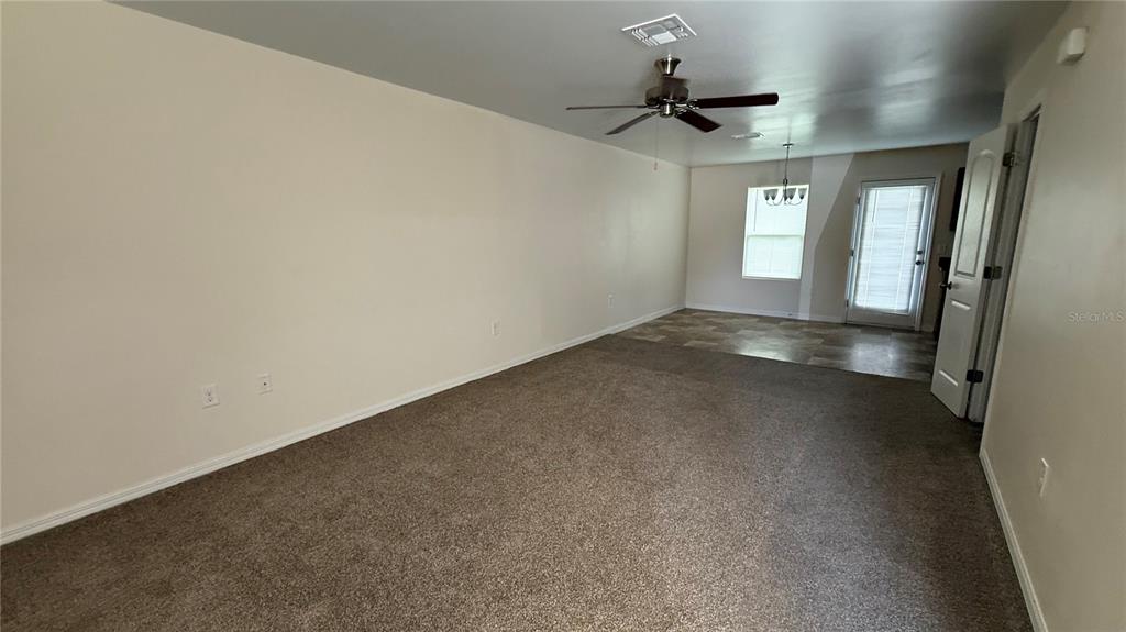 3616 Marshall Road North Port, FL 34288 - Photo 2 of 15 a view of a room with a ceiling fan and window