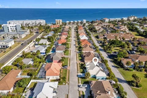 an aerial view of residential building and parking space