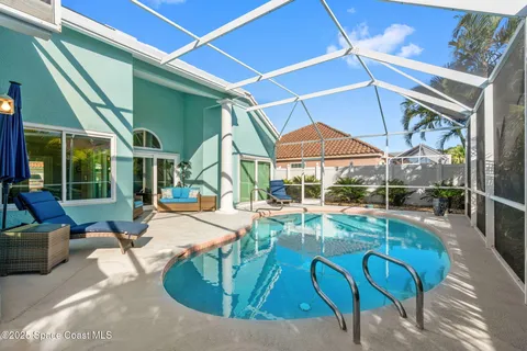a view of a living room and wooden floor