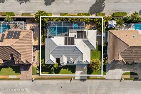 a view of a house with a porch and a garden