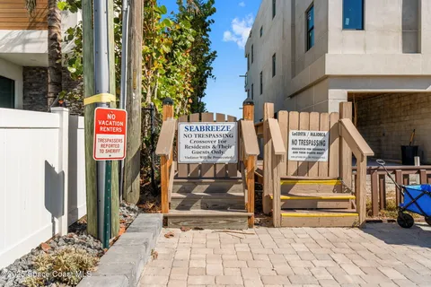 a view of balcony with wooden floor