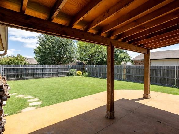 8209 Woodside Road Rowlett, TX 75088 - Photo 27 of 30 Stained concrete stained concrete covered patio