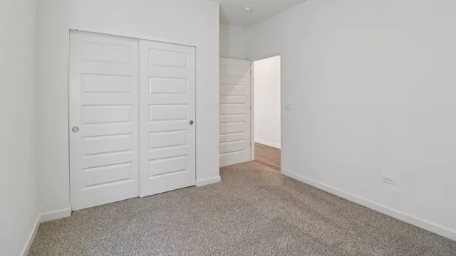 an empty room with closet