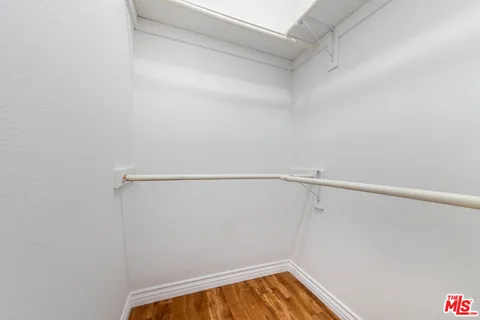 a view of a room with racks on the wall