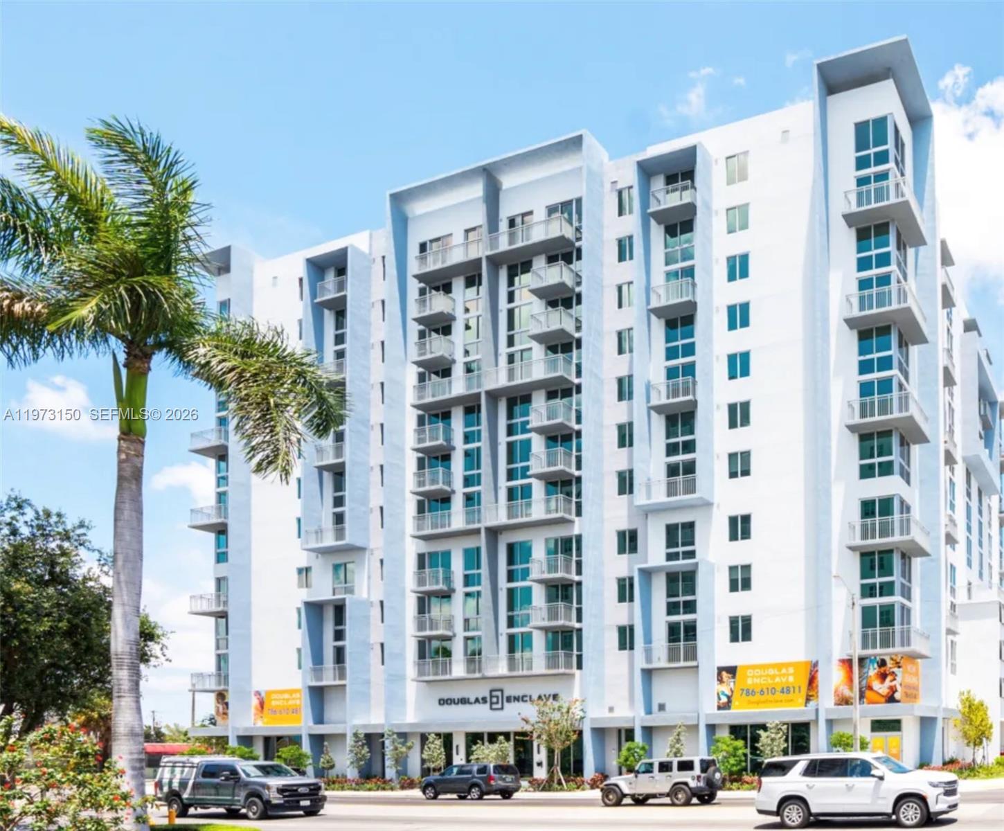 61 Northwest 37th Avenue, Unit 414 Miami, FL 33125 - Photo 1 of 18 a front view of a multi story building