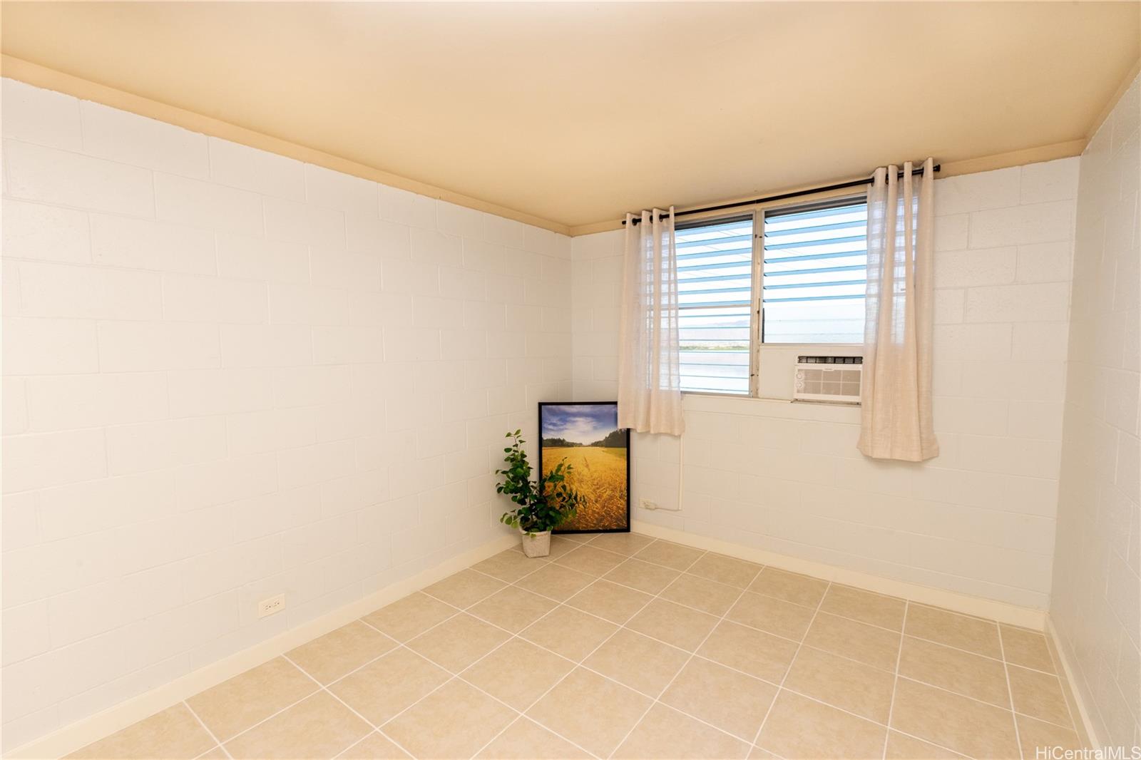 98-135 Lipoa Place, Unit 301 Aiea, HI 96701 - Photo 13 of 17 a view of room with window