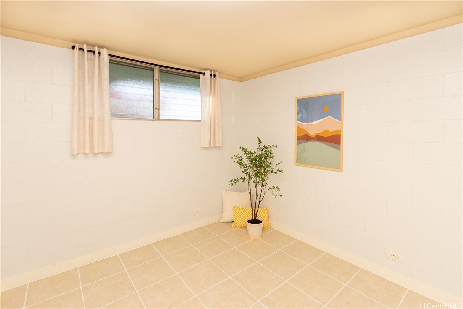 98-135 Lipoa Place, Unit 301 Aiea, HI 96701 - Photo 15 of 17 a view of an empty room