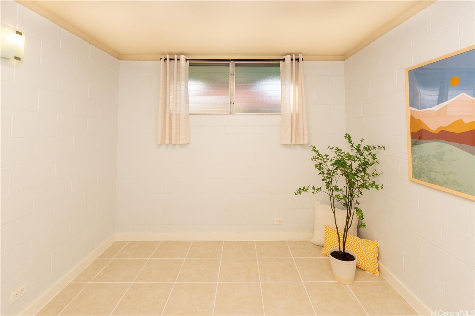 98-135 Lipoa Place, Unit 301 Aiea, HI 96701 - Photo 16 of 17 a view of an empty room