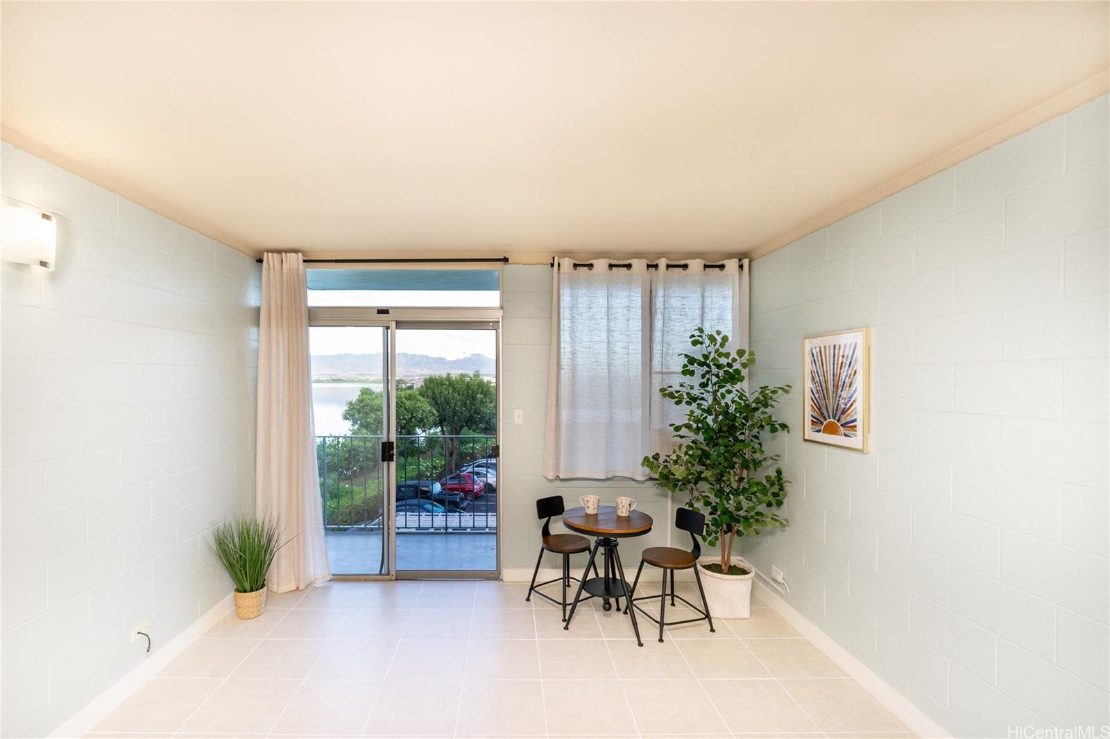 98-135 Lipoa Place, Unit 301 Aiea, HI 96701 - Photo 4 of 17 a workspace with furniture and a window