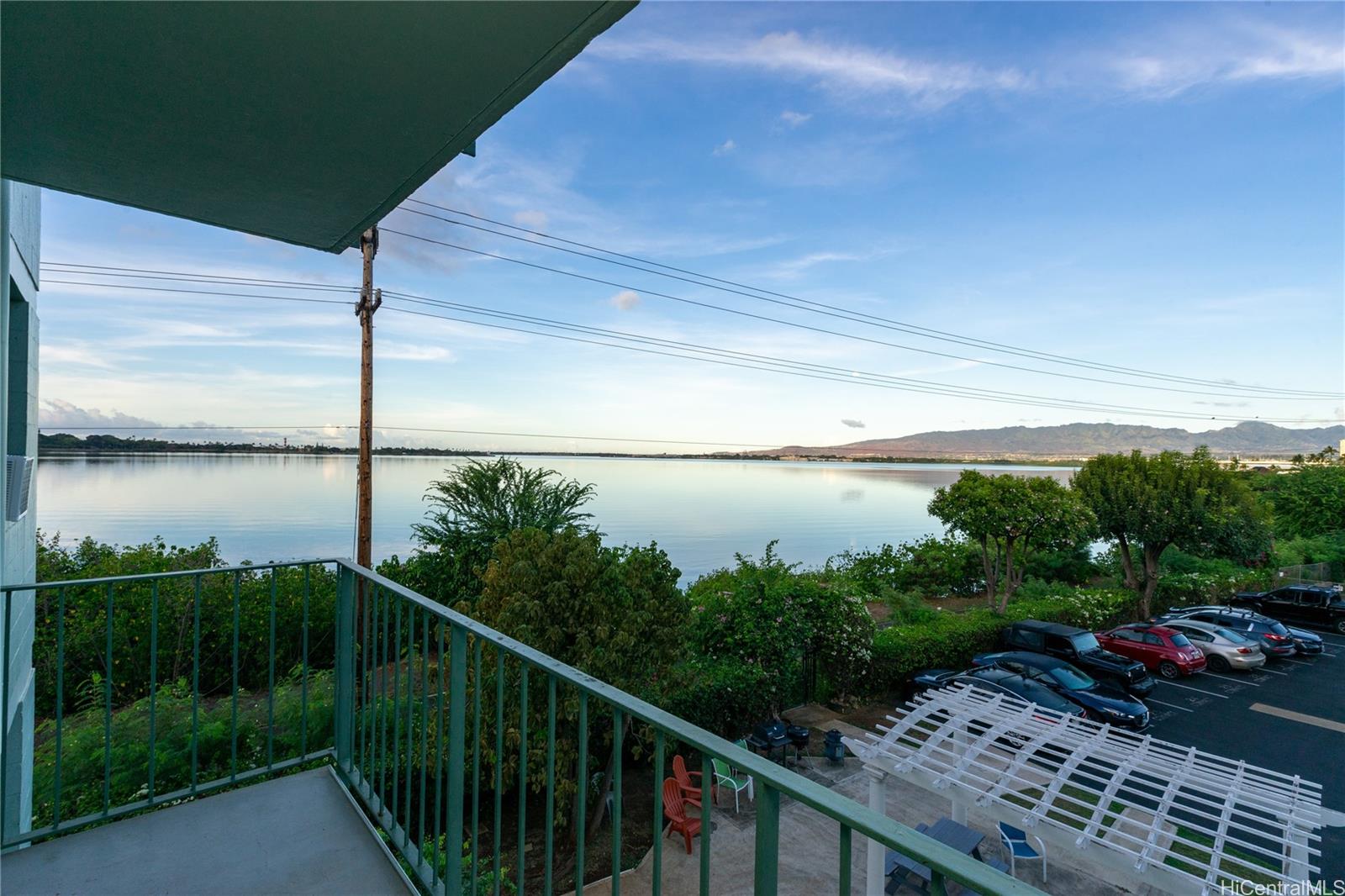 98-135 Lipoa Place, Unit 301 Aiea, HI 96701 - Photo 10 of 17 a balcony with next to a yard