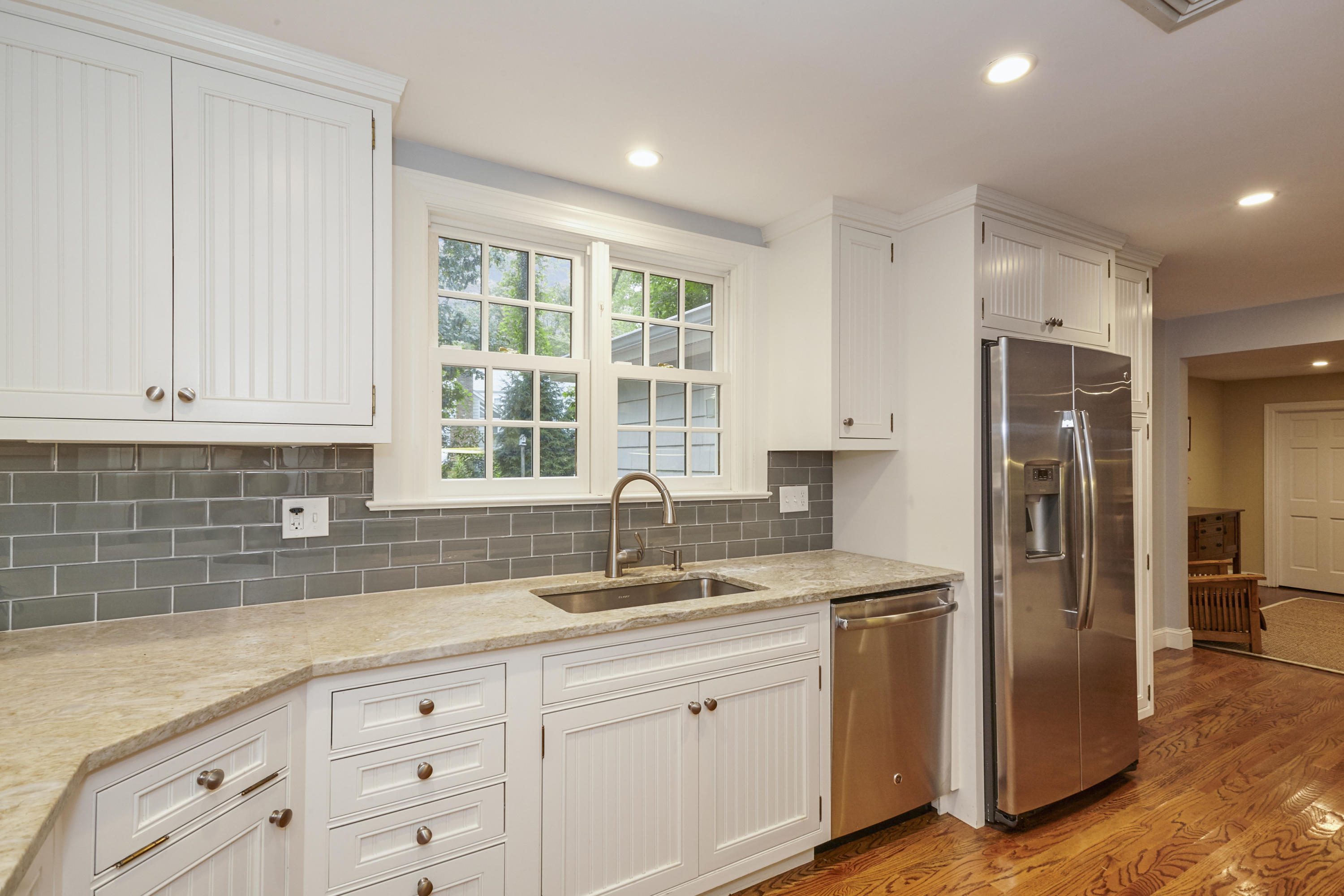 20 Homestead Road Darien, CT 06820 - Photo 21 of 48 a kitchen with white cabinets and sink