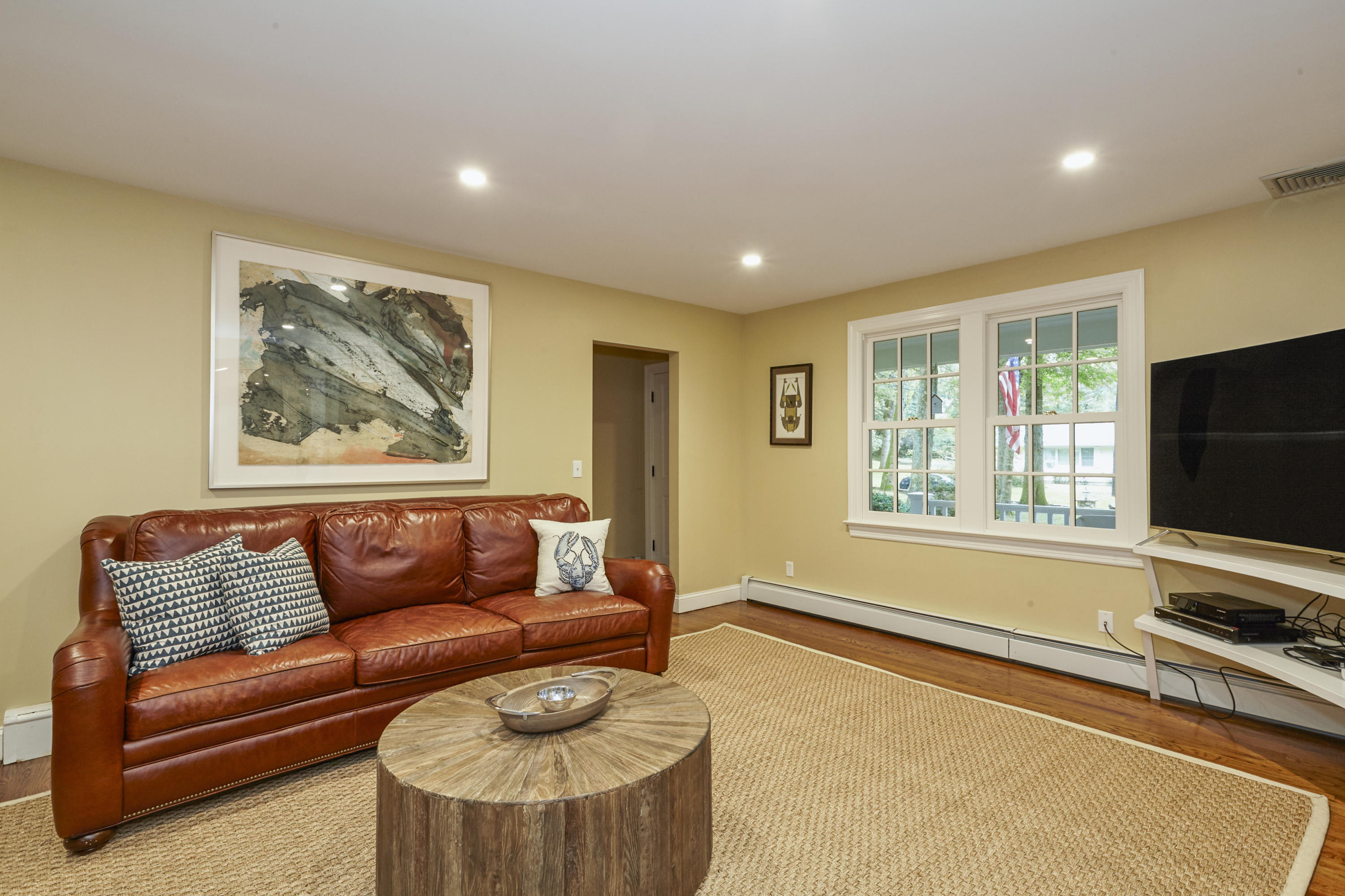 20 Homestead Road Darien, CT 06820 - Photo 22 of 48 a living room with furniture and a flat screen tv