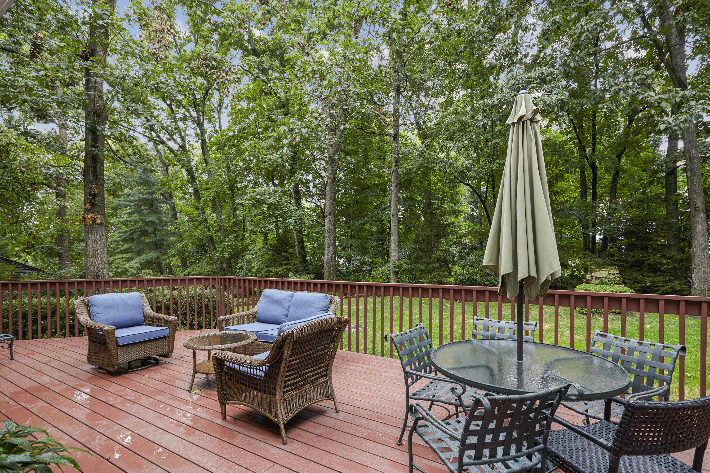 20 Homestead Road Darien, CT 06820 - Photo 41 of 48 a view of a patio with a table chairs and a small yard