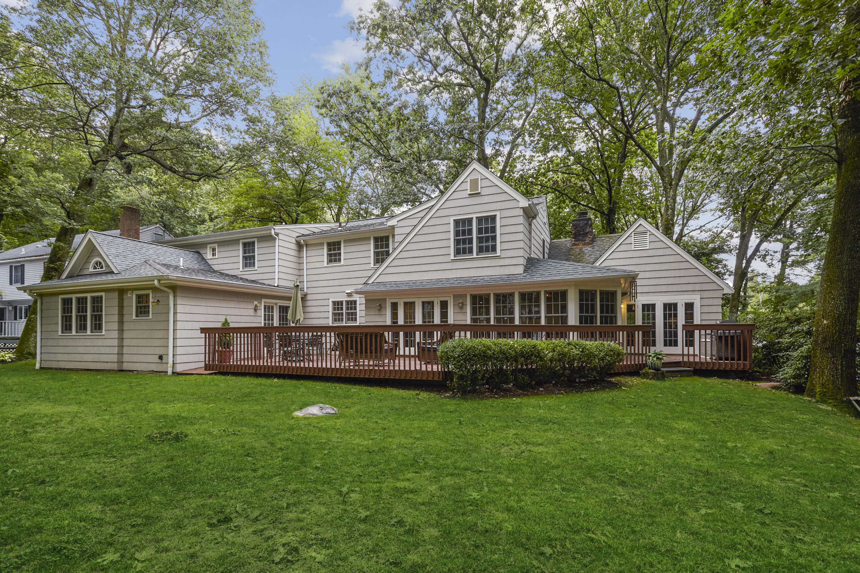 20 Homestead Road Darien, CT 06820 - Photo 44 of 48 a front view of a house with a garden