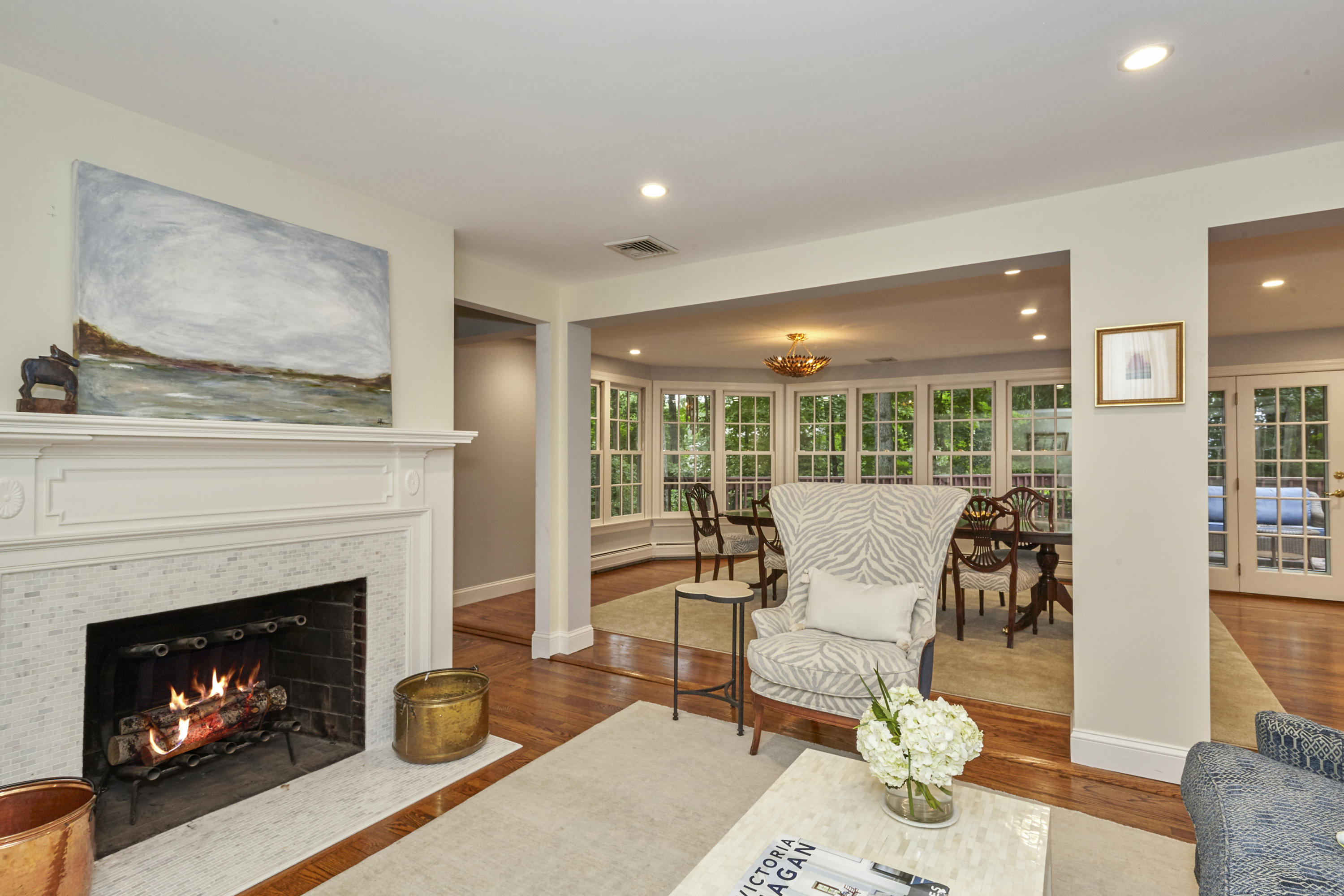 20 Homestead Road Darien, CT 06820 - Photo 8 of 48 a living room with furniture and a fireplace
