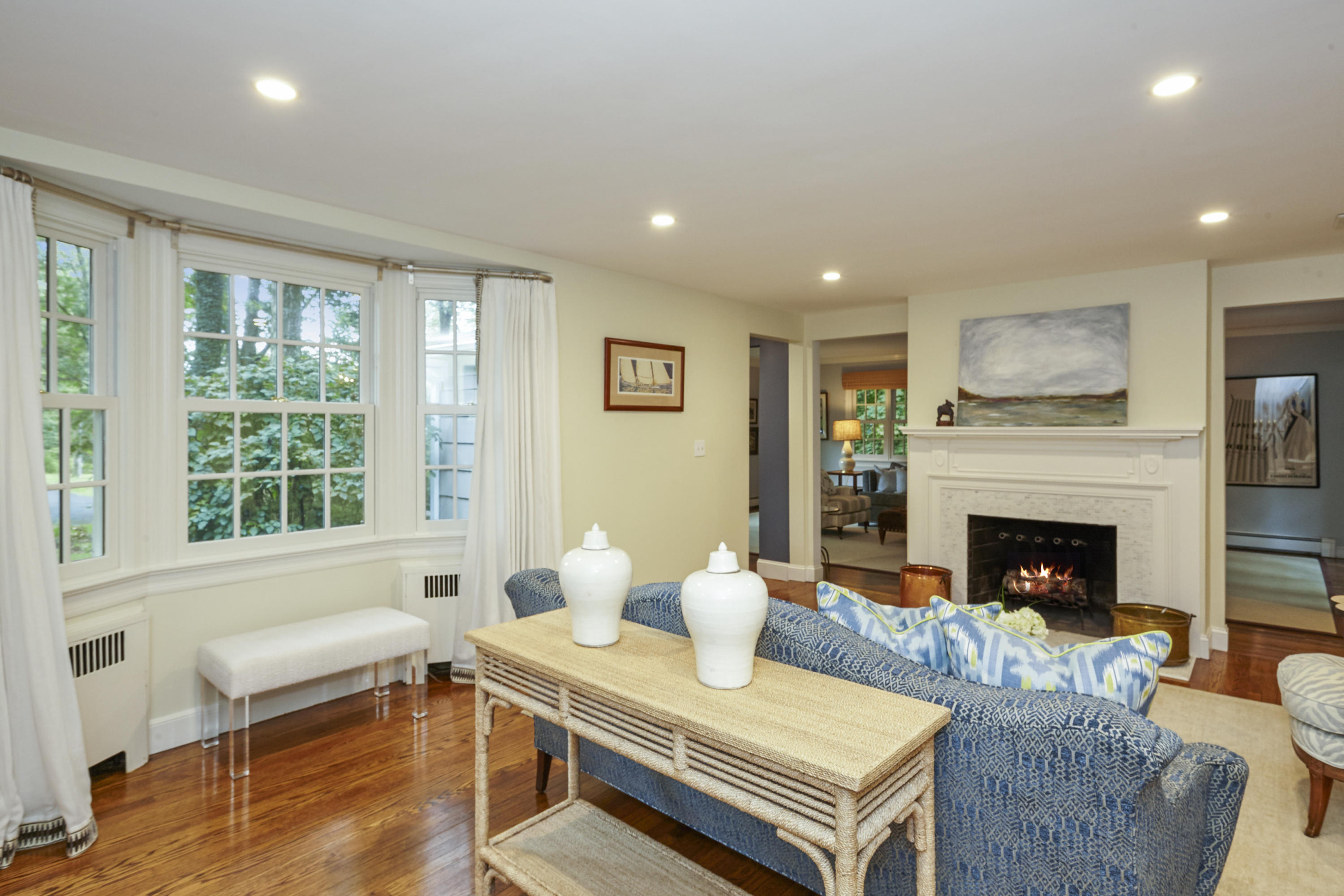 20 Homestead Road Darien, CT 06820 - Photo 10 of 48 a living room with furniture a fireplace and a table