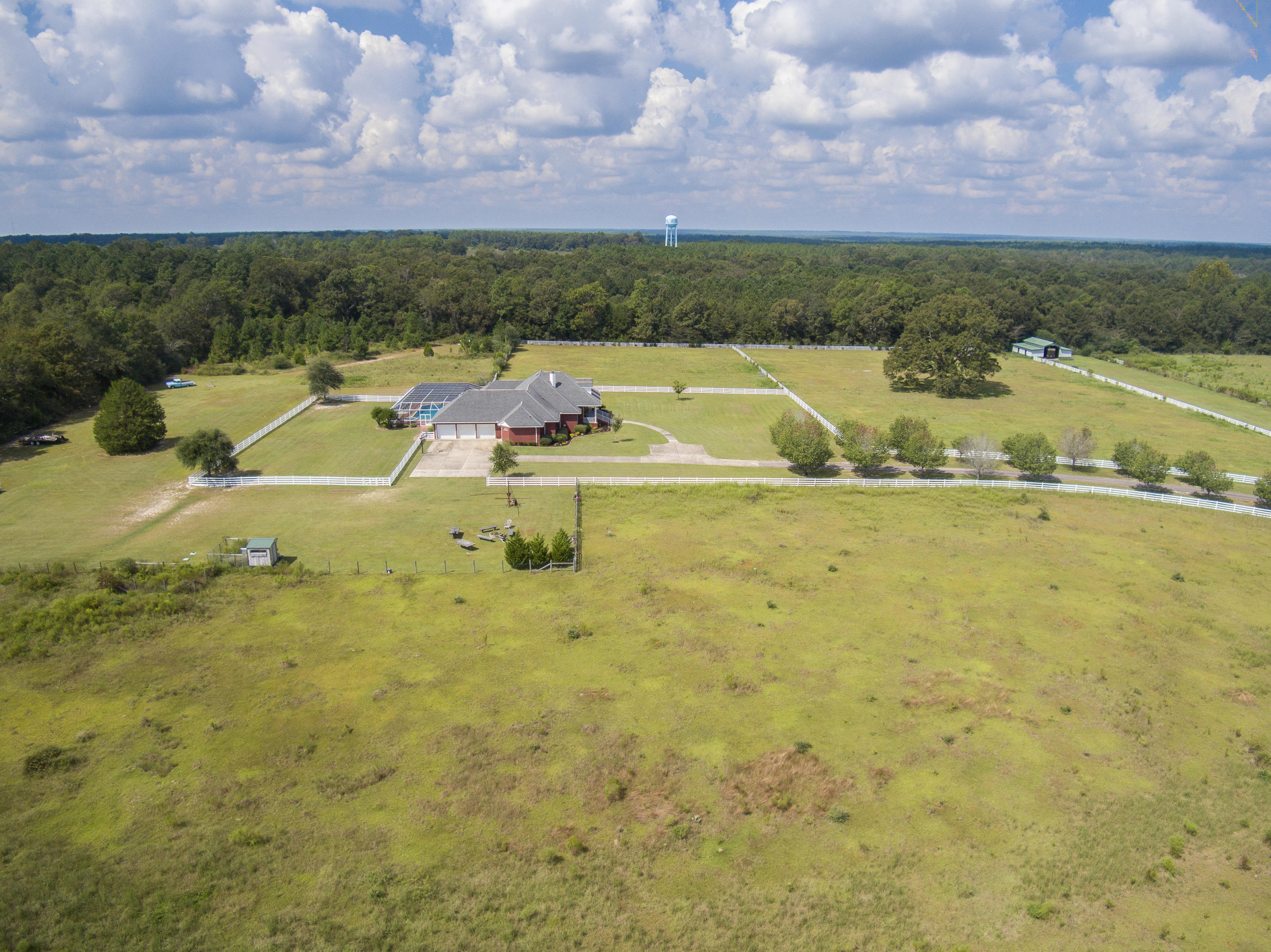 1498 Sky Ranch Lane Baker, FL 32531 - Photo 14 of 86 a view of a swimming pool and a yard