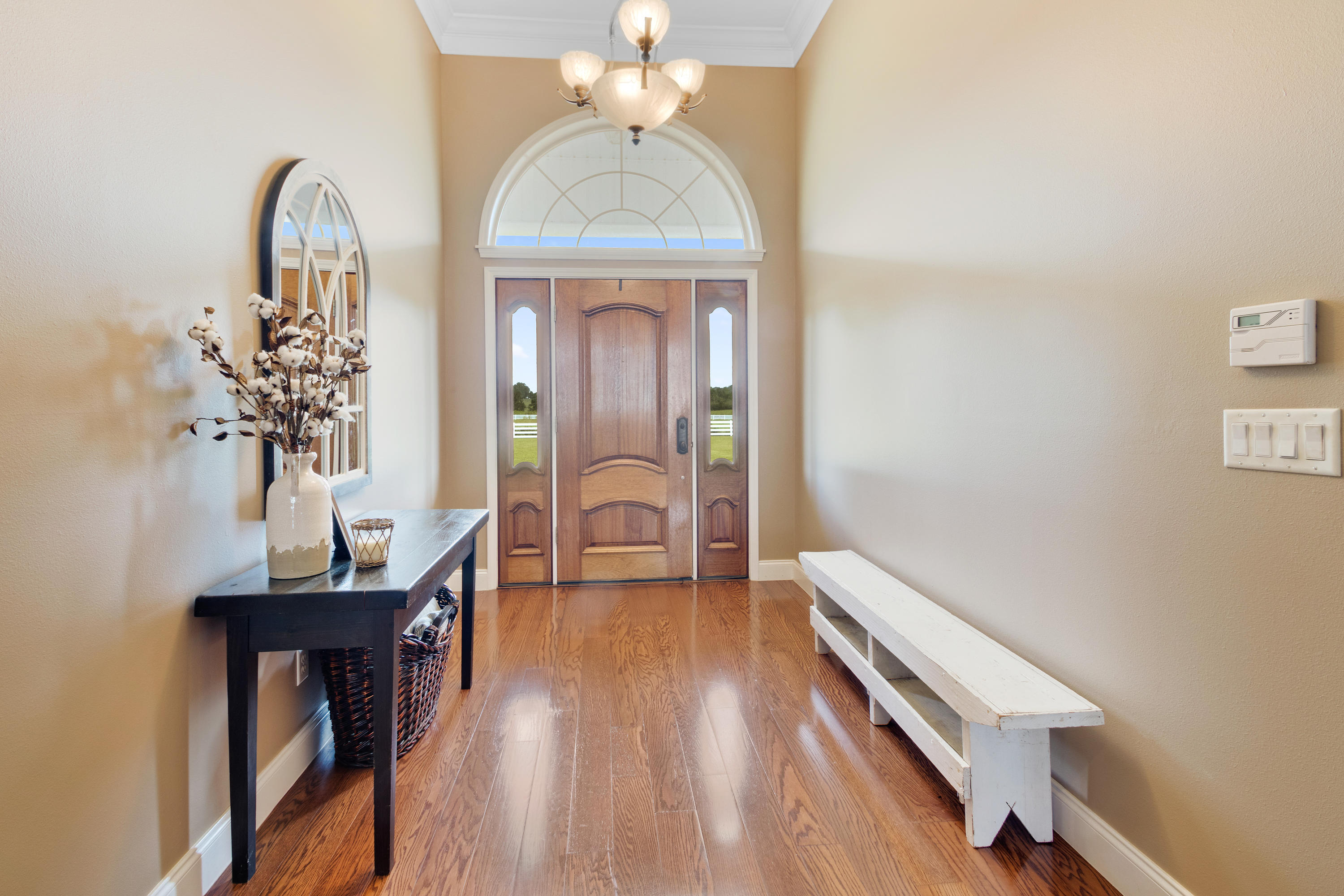 1498 Sky Ranch Lane Baker, FL 32531 - Photo 17 of 86 a view of hall way with furniture and wooden floor