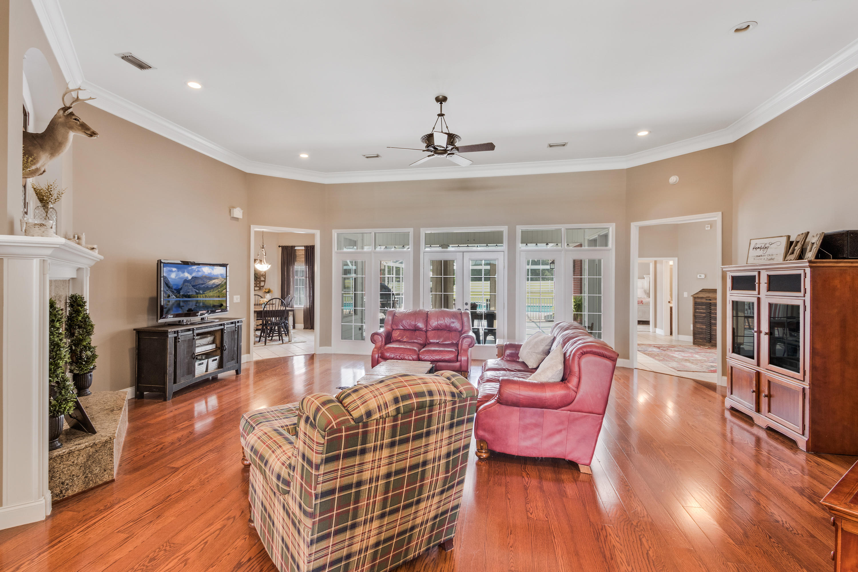 1498 Sky Ranch Lane Baker, FL 32531 - Photo 20 of 86 a living room with furniture and a flat screen tv