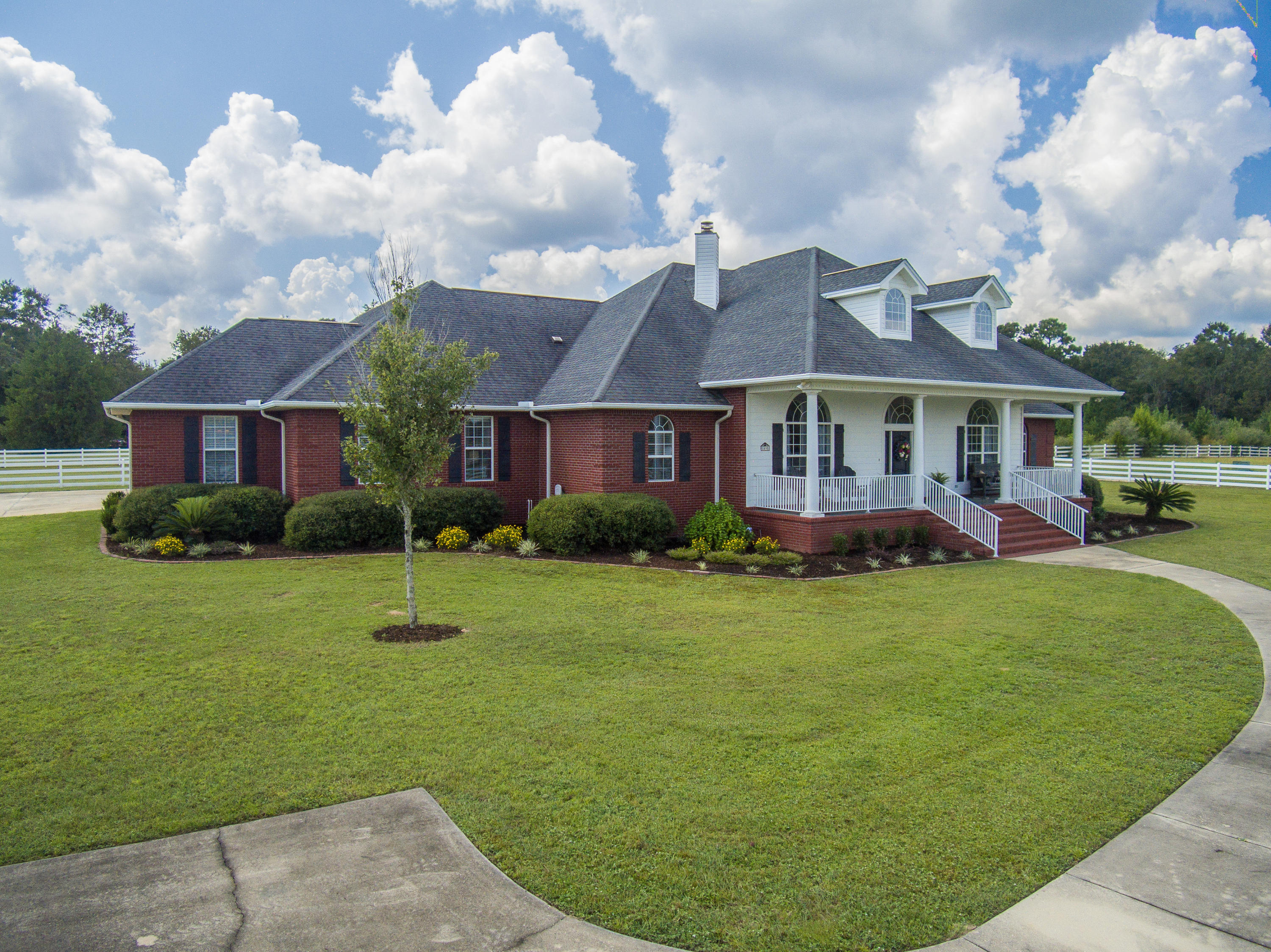 1498 Sky Ranch Lane Baker, FL 32531 - Photo 4 of 86 a view of a house with a backyard