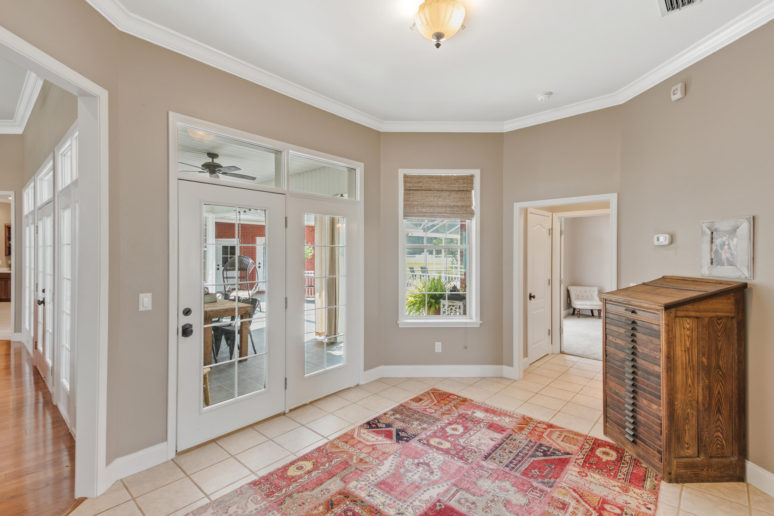 1498 Sky Ranch Lane Baker, FL 32531 - Photo 38 of 86 a spacious bedroom with a bed and wooden floor