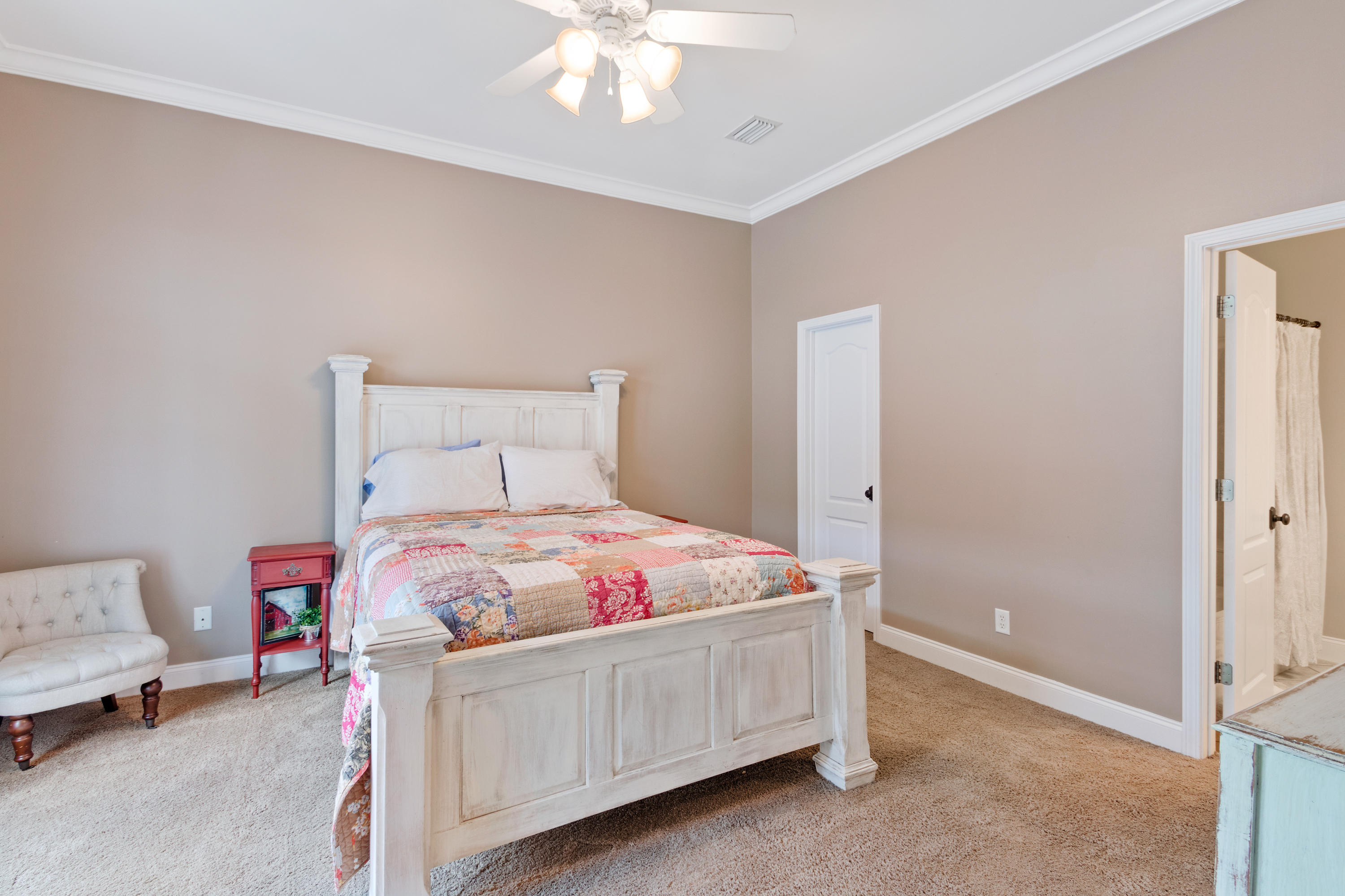 1498 Sky Ranch Lane Baker, FL 32531 - Photo 45 of 86 a bedroom with a bed and a chandelier