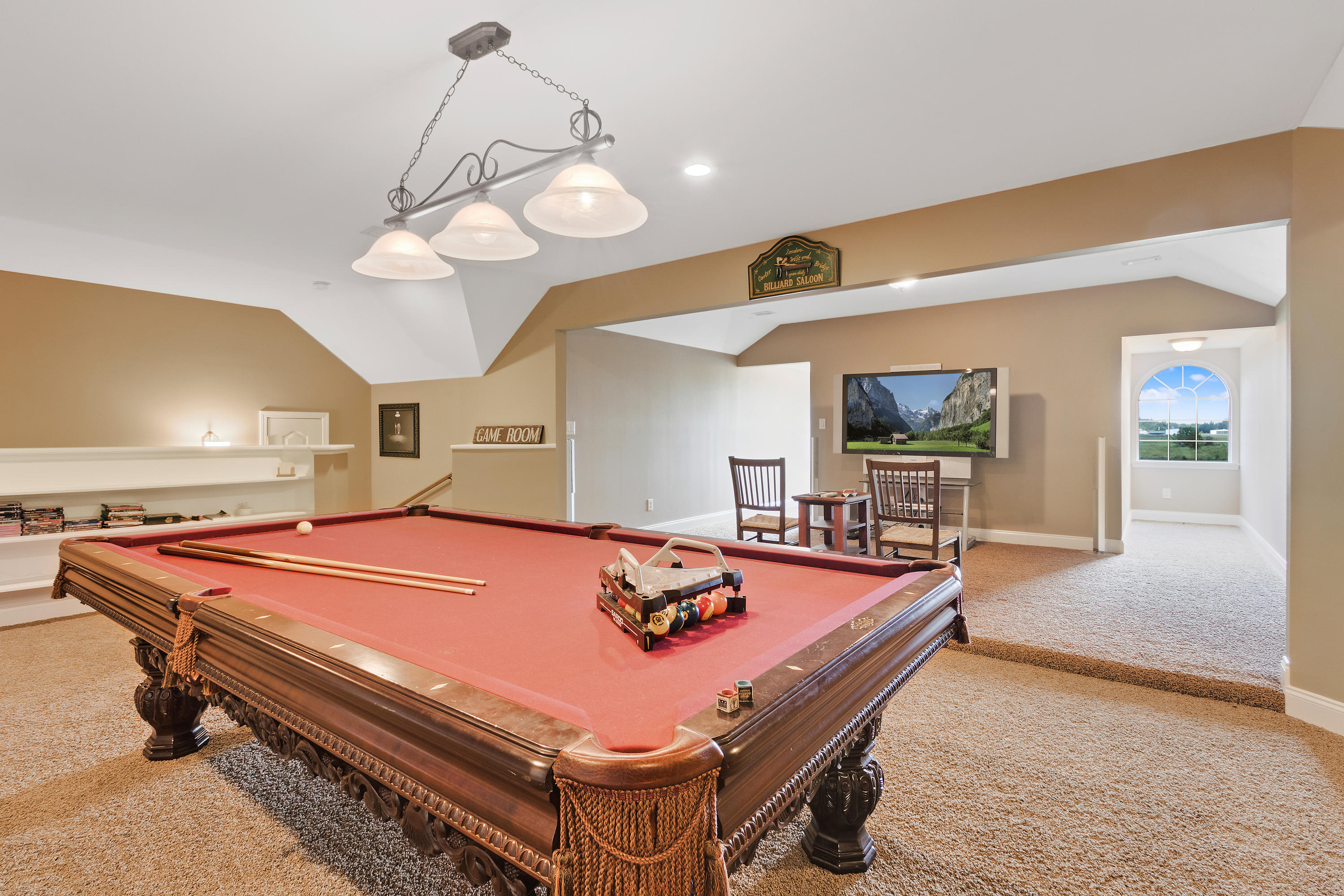 1498 Sky Ranch Lane Baker, FL 32531 - Photo 48 of 86 a room with pool table and a flat screen tv