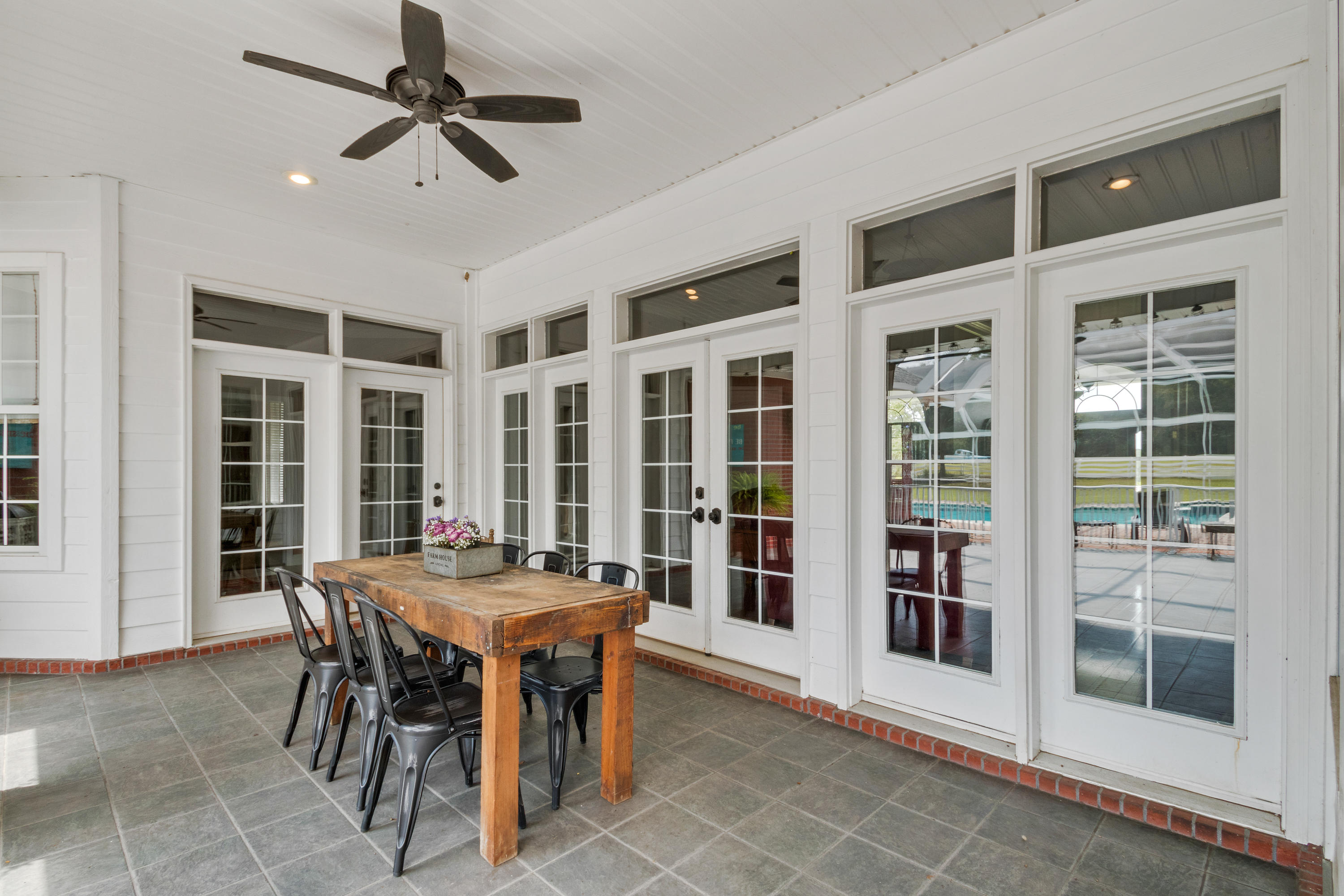 1498 Sky Ranch Lane Baker, FL 32531 - Photo 60 of 86 a view of a dining room with furniture window and outside view