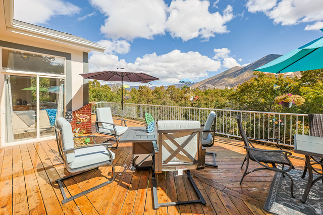 569 Elk Meadow Loop Tooele, UT 84074 - Photo 14 of 56 Deck featuring an outdoor living / dining area