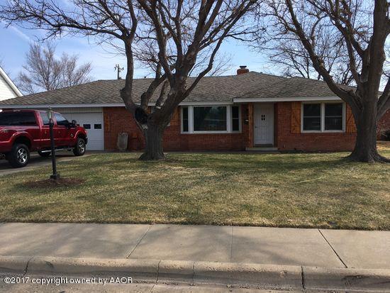 6107 Dreyfuss Road Amarillo, TX 79106 - Photo 1 of 1 a front view of house with yard and trees