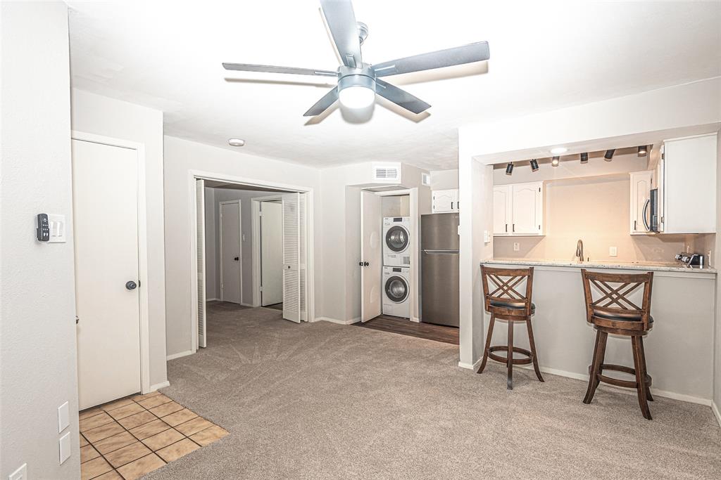 3022 Forest Lane, Unit 308 Dallas, TX 75234 - Photo 4 of 8 Don't miss the New Stackable Washer & Dryer. Also - two bar stools come with unit for entertaining or dining