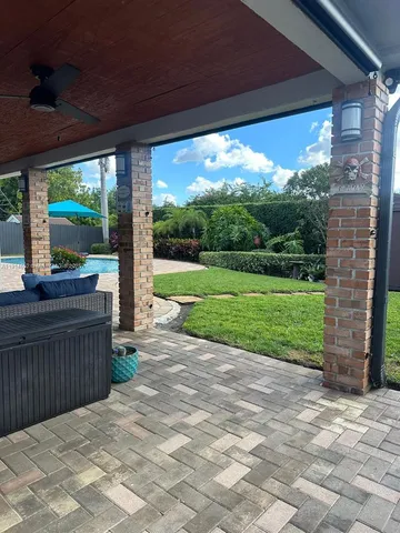 a view of a porch with a yard